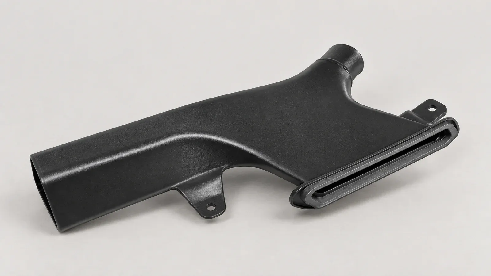 Real black Manuplast blow molded vehicle-interior air duct with branching channels